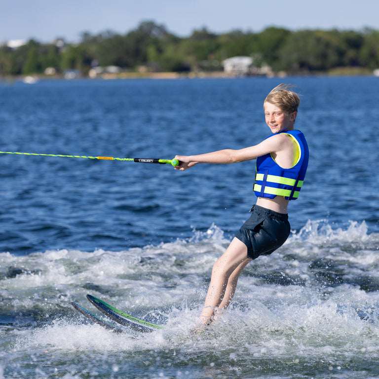 boy waterskiing on a lake