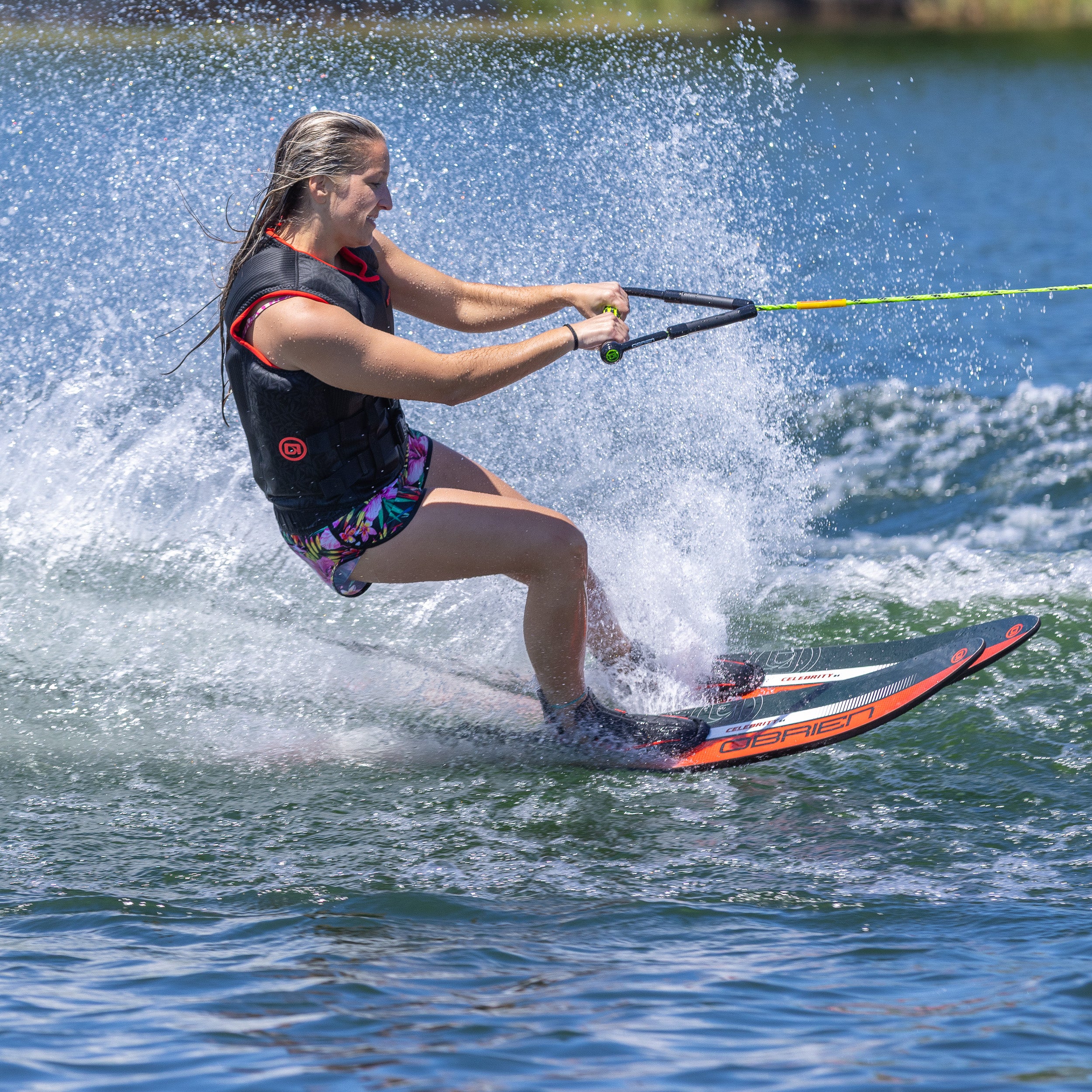 Person water skiing on a lake.